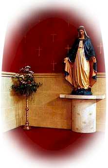 Blessed Virgin Mary statue - left of altar